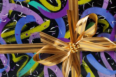 gift paper with golden ribbon
