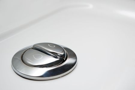economic toilet flush knob with two separate buttonsの写真素材