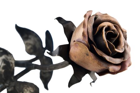 melallic forged rose flower isolated on whiteの写真素材