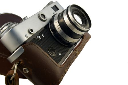 old rangefinder in brown leather case isolated on white