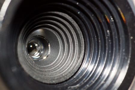 dusty camera lens with hood close-upの写真素材