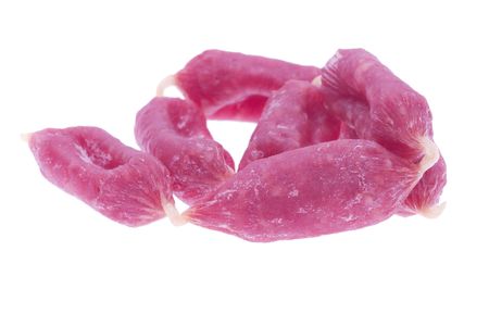 pile of dried small beef sausagesの写真素材