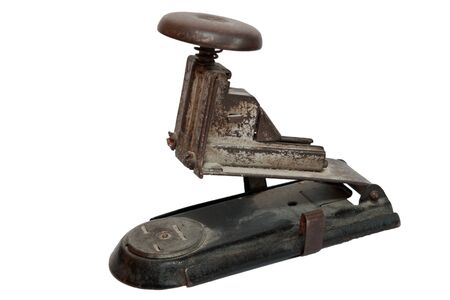antique stapler isolated on whiteの写真素材