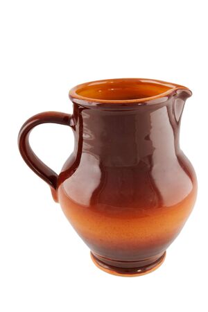 red clay pitcher isolated on whiteの写真素材