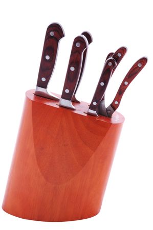 knives set in stand isolated on whiteの写真素材