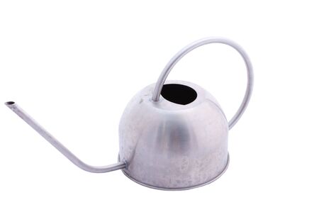 watering can made of stainless steel isolated on whiteの写真素材
