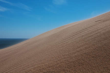 dune slope on the windy day の写真素材