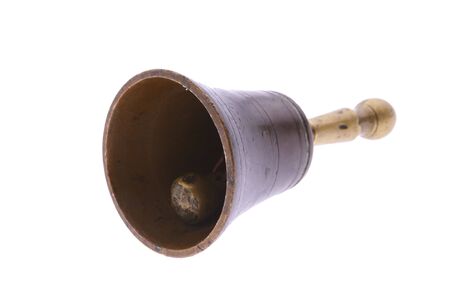 bronze hand bell isoated on whiteの写真素材