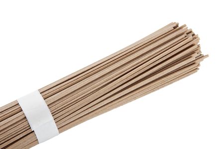 japanese dry soba noodles portion isolated on whiteの写真素材