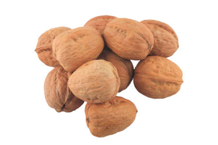 heap of walnuts isolated on whiteの写真素材