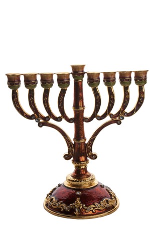 ornate bronze menorah isolated  on whiteの写真素材