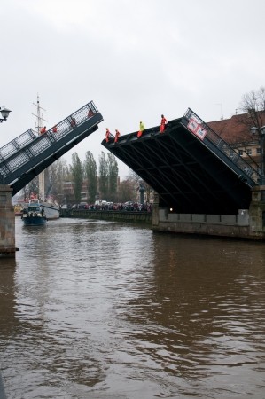 KLAIPEDA, LITHUANIA  NOVEMBER 10: the first drawbridge all set for pass of Klaipeda city symbol barquentine "Meridianas"  to the major overhaul on November 10, 2012 in Klaipeda.のeditorial素材