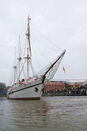 KLAIPEDA, LITHUANIA  NOVEMBER 10: Klaipeda city symbol barquentine "Meridianas" approaches the second drawbridge on her way to the major overhaul  on November 10, 2012 in Klaipeda.のeditorial素材