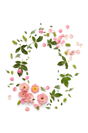 Flat nature floral round frame on white background, top view. Ornament with rose flowers, petals, succulent plants and green leaves.の写真素材