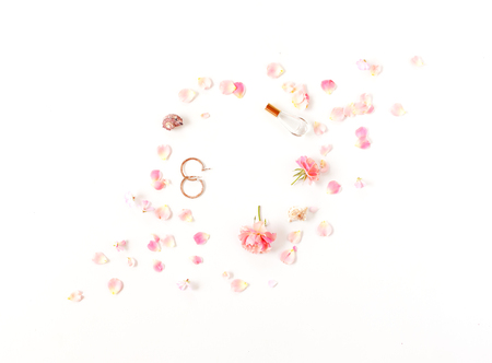 creative floral arrangement with beauty accessories. flat lay, top viewの写真素材