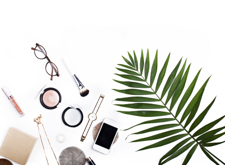 Palm leaf travel concept flat. Feminine accessories isolated on white background.の写真素材