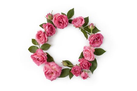 Floral round wreath. Flowers composition made of roses and leaves isolated with shadows on white background. Top view.の写真素材