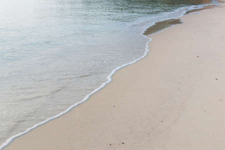 Sea wave motion on  sand beach.の写真素材