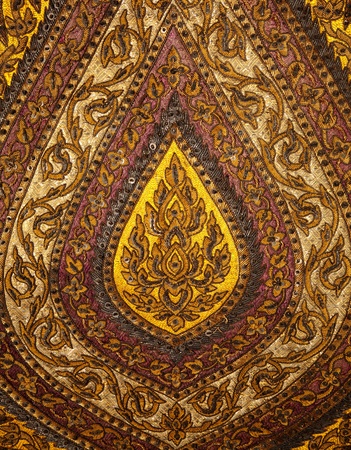 Old art pattern on the fabric bakgroundの写真素材