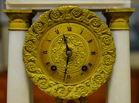 Antique clock on a white column in the Russian orthodox church.