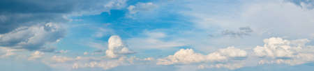 Beautiful blue cloudy sky. A panoramic composition in high resolution. Nature.