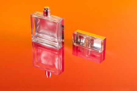 Bottle of perfume on the redの写真素材