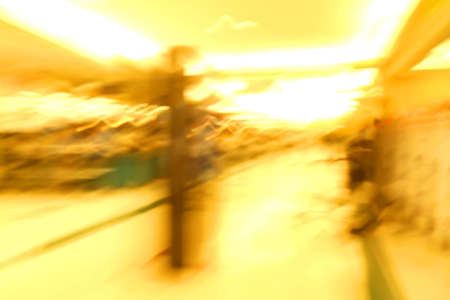 Blurry photo of the interior of a shopping mall の写真素材