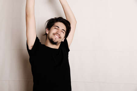 Portrait of a happy young hispanic man.の写真素材