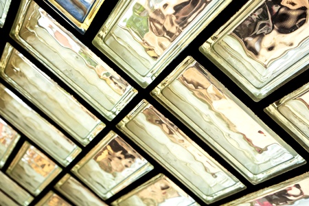 A glass brick wall background. Architecture interior.の写真素材