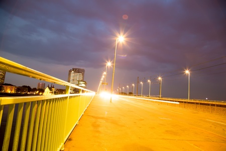 A bridge in Cologne, Germany at night.の写真素材