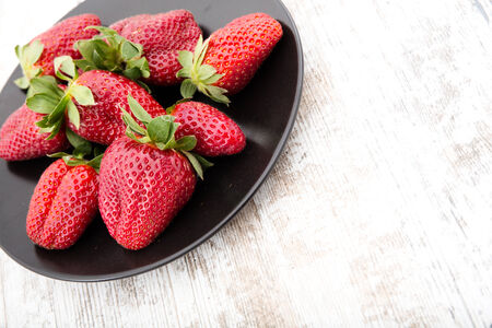 Fresh strawberries in the kitchen.の写真素材