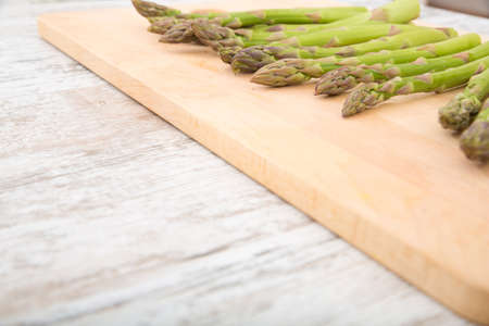 Fresh Asparagus on a wooden tablet.の写真素材