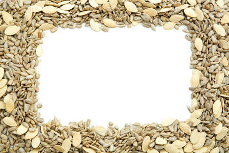 A frame made of organic seeds. White background isolation.の写真素材