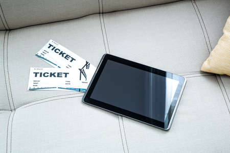 Buy Cinema Tickets online with a Tablet PCの写真素材
