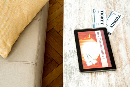 Buy Cinema Tickets online with a Tablet PCの写真素材
