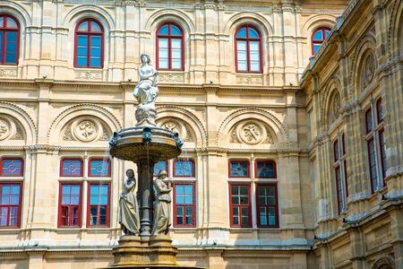 A fountain with Statues in front of the Opera in Vienna, Austria, Europe.のeditorial素材