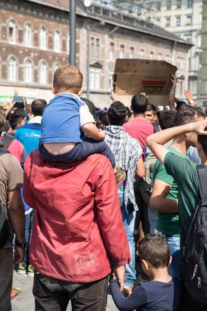 BUDAPEST, HUNGARY - SEPTEMBER 01: Stranded Refugees waiting in front of the eastern Train Station Keleti Palyudvar on September 01, 2015 in Budapest, Hungary.のeditorial素材