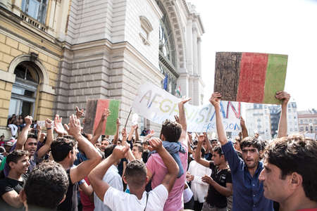 BUDAPEST, HUNGARY - SEPTEMBER 01: Stranded Refugees protest in front of the eastern Train Station Keleti Palyudvar on September 01, 2015 in Budapest, Hungary.のeditorial素材