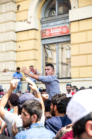BUDAPEST, HUNGARY - SEPTEMBER 01: Stranded Refugees protest and demand free passage to Germany at the eastern Train Station Keleti Palyudvar on September 01, 2015 in Budapest, Hungary.のeditorial素材