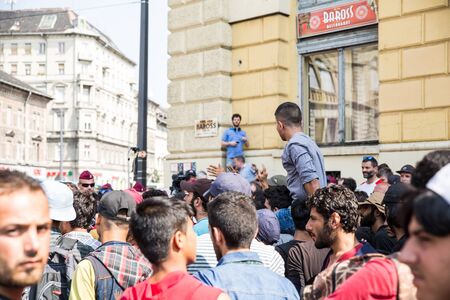 BUDAPEST, HUNGARY - SEPTEMBER 01: Stranded Refugees protest and demand free passage to Germany at the eastern Train Station Keleti Palyudvar on September 01, 2015 in Budapest, Hungary.のeditorial素材