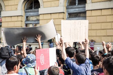 BUDAPEST, HUNGARY - SEPTEMBER 01: Stranded Refugees protest and demand free passage to Germany at the eastern Train Station Keleti Palyudvar on September 01, 2015 in Budapest, Hungary.のeditorial素材