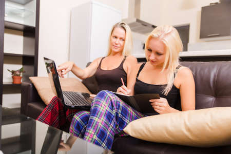 Mother and daughter with a laptop