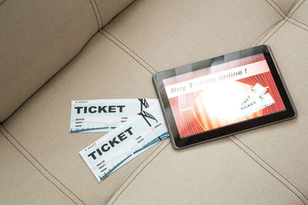 Buy Cinema Tickets online with a Tablet PCの写真素材