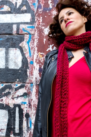 Pretty woman waiting at graffiti wallの写真素材