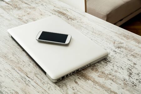 Smartphone and a laptop computer