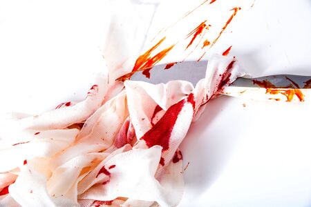 Blood and bandages on a white background.の写真素材