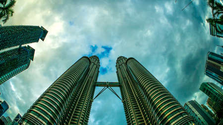 KUALA LUMPUR, MALAYSIA - FEBRUARY 07, 2016: View of rainy clouds as they move over the famous Petronas towers on February 07, 2016 in Kuala Lumpur, Malaysia.のeditorial素材