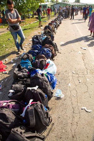 TOVARNIK, CROATIA - SEPTEMBER 18: Line of Bags of Refugees on September 18, 2015 in Tovarnik, Croatia.のeditorial素材