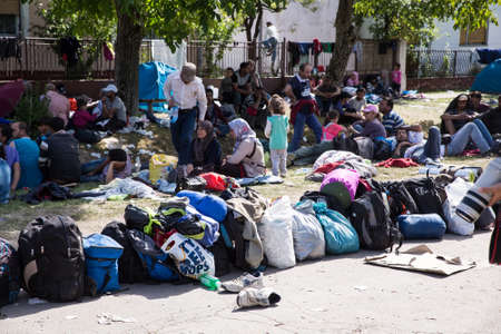 TOVARNIK, CROATIA - SEPTEMBER 19: Scene in the Refugee camp to the border of Serbia on September 19, 2015 in Tovarnik, Croatia.のeditorial素材