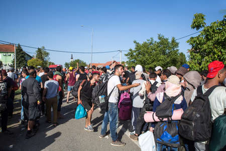 TOVARNIK, CROATIA - SEPTEMBER 18: Scene in the Refugee camp to the border of Serbia on September 18,...